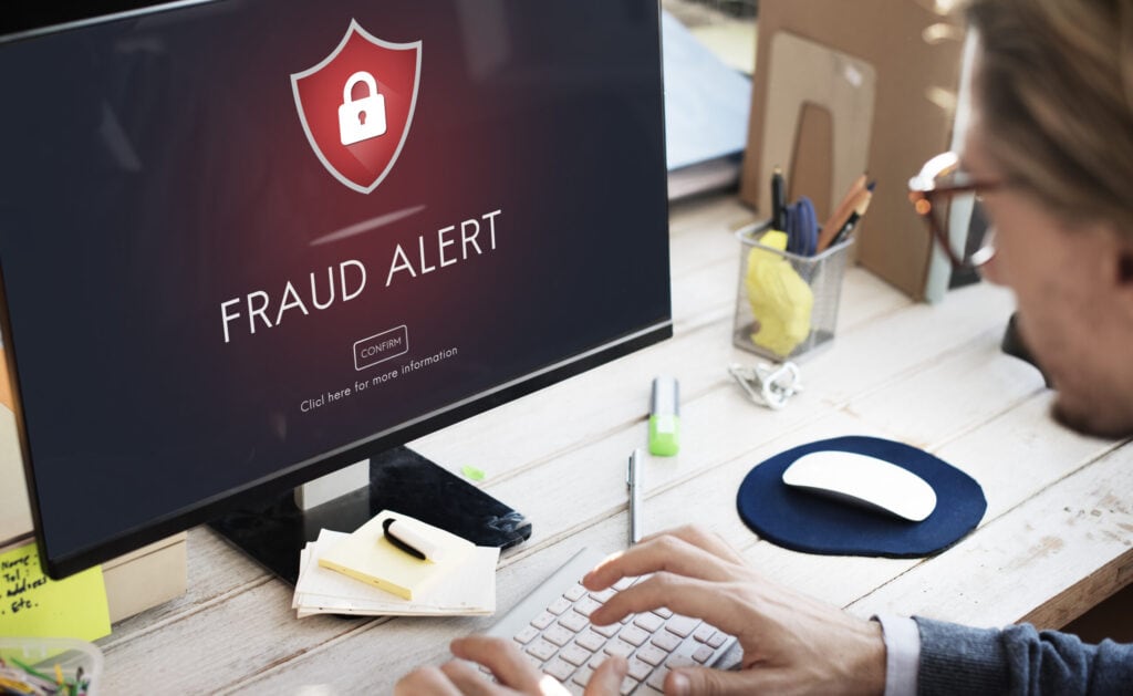 Computer Monitor with a Fraud Alert Warning